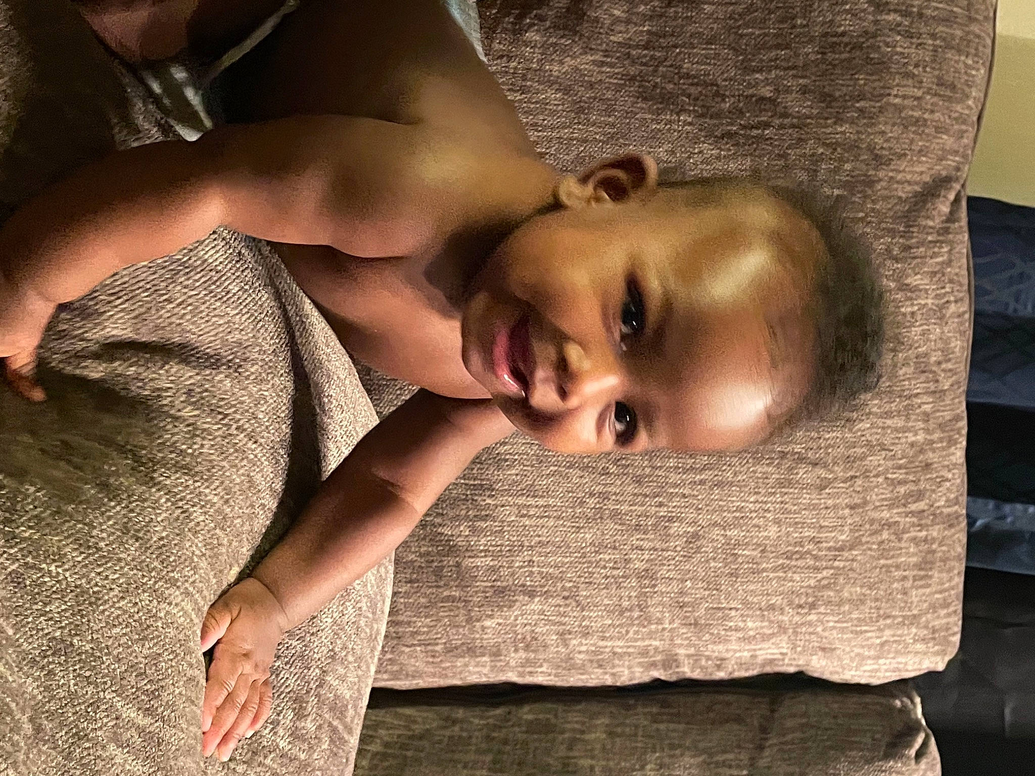 Fendi is registered to the contest to win money with this photo: arm, chest, child, comfort, eyelash, facial_expression, finger, flash_photography, gesture, hairstyle, hand, happy, human, lip, mammal, mouth, neck, person, skin, textile