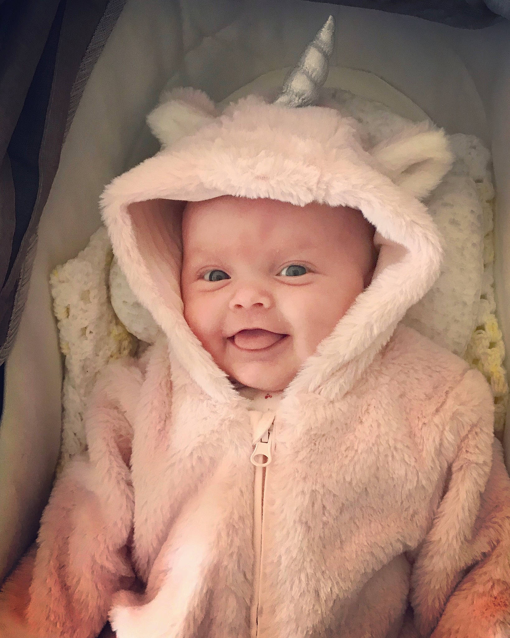 Darcey is registered to the contest to win money with this photo: baby, cheek, child, eye, face, fur, fur_clothing, head, person, skin, smile, textile, toddler