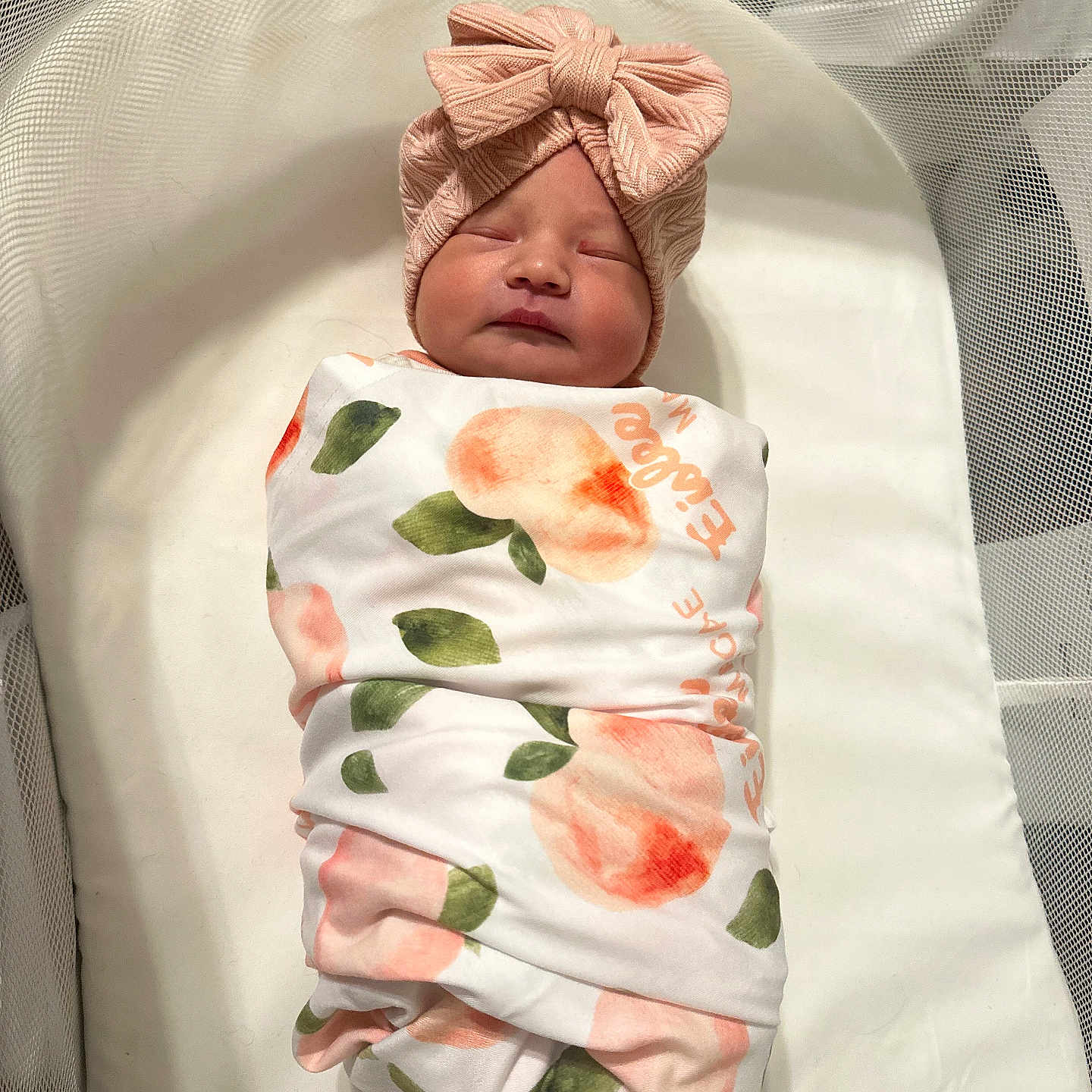 Eislee is registered to the contest to win money with this photo: baby, blanket, crib, face, furniture, head, infantbed, person