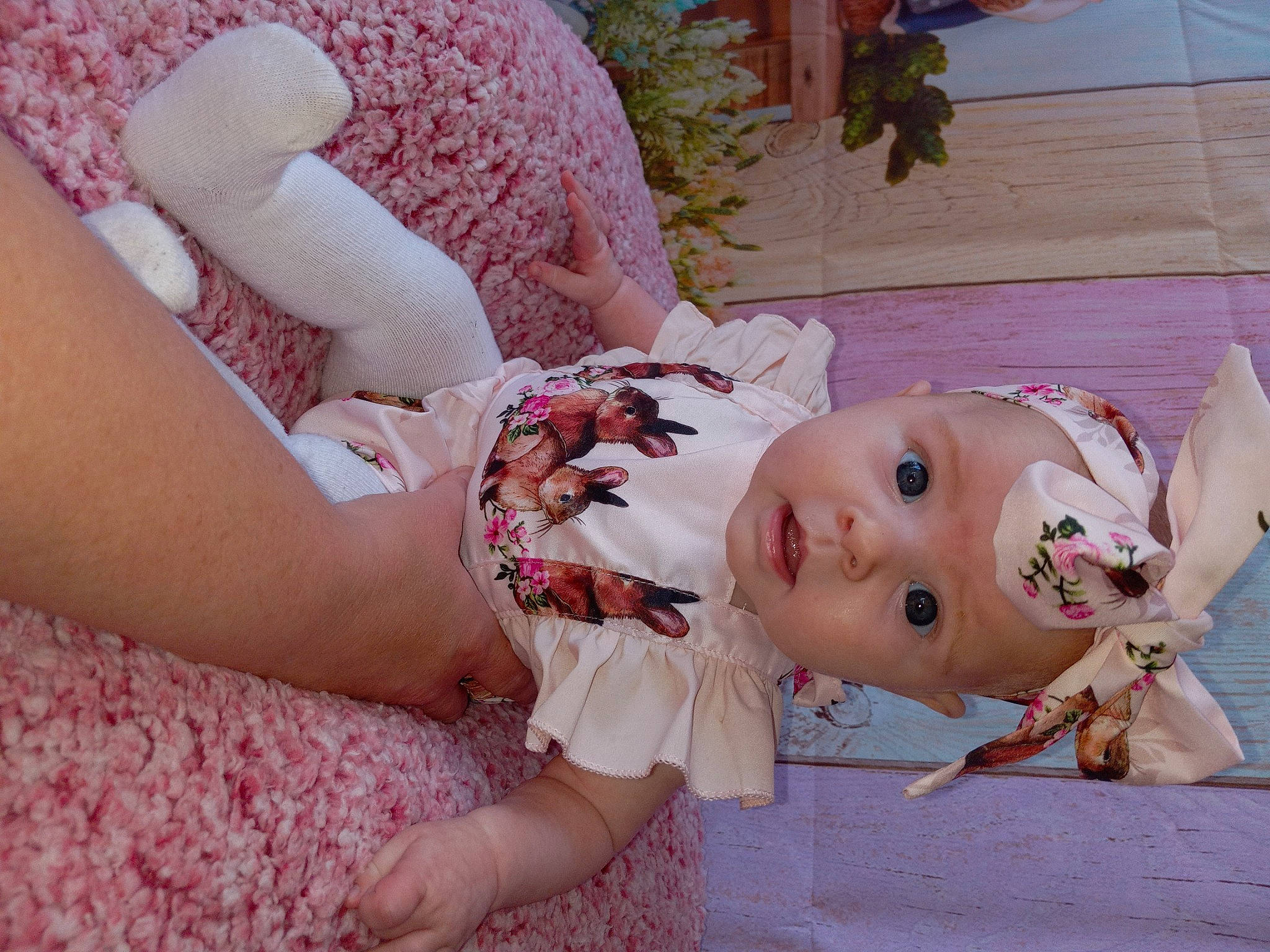 Octavia is registered to the contest to win money with this photo: child, doll, dress, eyelash, grass, happy, headwear, human_leg, joint, pattern, peach, person, petal, pink, plant, purple, rose, skin, spring, surprise