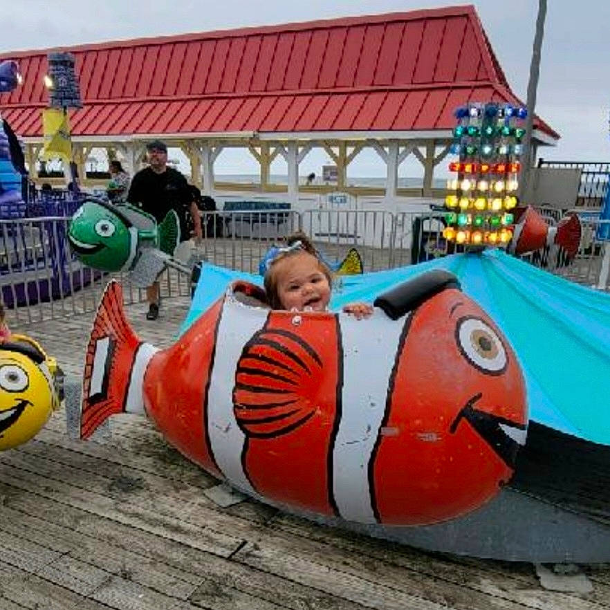 Eviana joined the competition — help win amazing prizes! fun, games, inflatable, leisure, person, personal_protective_equipment, play, recreation, sky, toddler, tourism, tree, watercraft