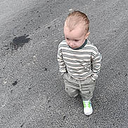 Lip participe au concours pour gagner de l'argent avec cette photo : alone, asphalt, boy, candid, cargo_pants, casual_clothing, child, curious, daylight, hands_in_pockets, motion_blur, outdoor, pavement, road, short_hair, sidewalk, striped_shirt, walking, white_shoes, young_child