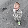 alone, asphalt, boy, candid, cargo_pants, casual_clothing, child, curious, daylight, hands_in_pockets, motion_blur, outdoor, pavement, road, short_hair, sidewalk, striped_shirt, walking, white_shoes, young_child