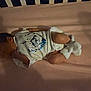 Everlee joined the competition — help win amazing prizes! newborn, baby, infant, sleeping, crib, onesie, socks, pink_sheet, bed, resting, peaceful, cute, child, indoors, soft_lighting, shadow, toddler, person, clothing, laying_down