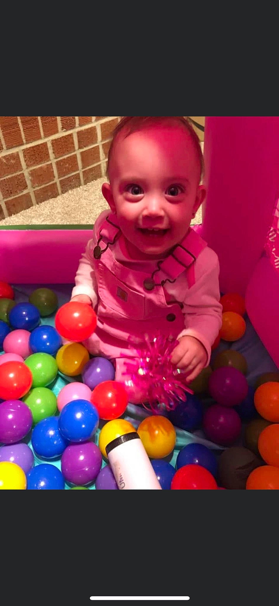 Lilyanne is registered to the contest to win money with this photo: baby, baby_playing_with_toys, ball, ball_pit, child, event, facial_expression, fun, happy, joy, leisure, party, party_supply, people, person, photograph, play, playground, smile, toddler