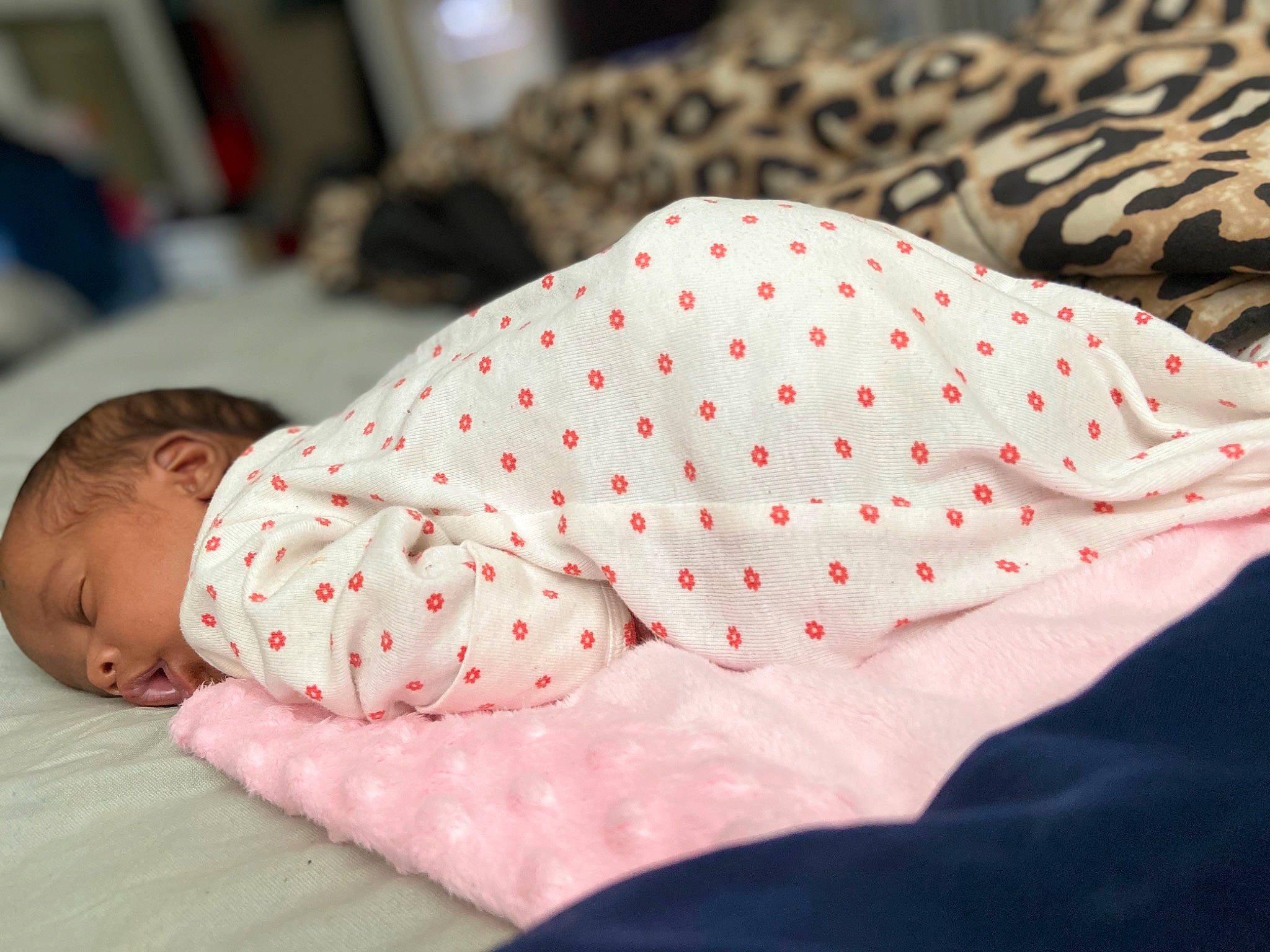 Nyliah is registered to the contest to win money with this photo: baby, baby_sleeping, bed_sheet, bedding, bedtime, child, design, linens, nap, nap_mat, pajamas, pattern, person, pink, polka_dot, room, skin, sleep, textile, toddler