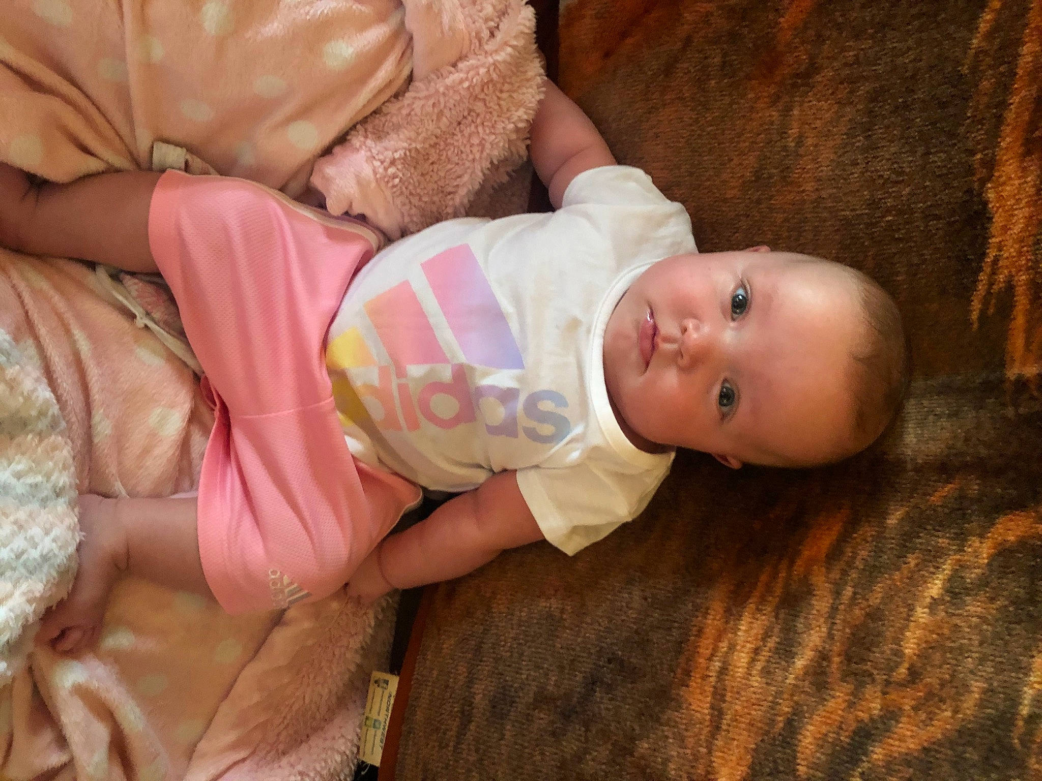 Alita is registered to the contest to win money with this photo: baby, baby_products, cheek, child, ear, eye, hand, nose, person, pink, product, skin, toddler