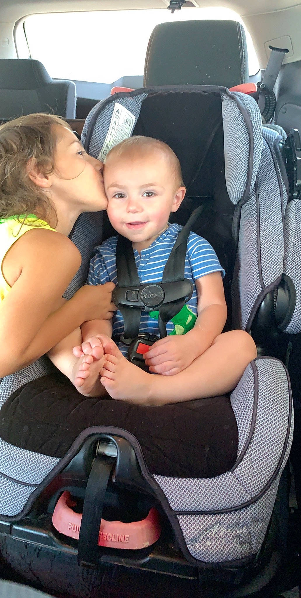 Gavin is registered to the contest to win money with this photo: auto_part, baby, baby_carriage, baby_in_car_seat, baby_products, car_seat, child, person, product, seat_belt, sitting, toddler