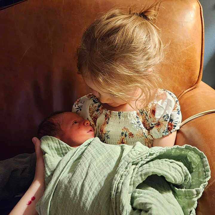 Alayah joined the competition — help win amazing prizes! architecture, baby, blanket, building, chair, clothing, couch, cushion, face, furniture, head, homedecor, hospital, indoors, newborn, person, photography, portrait, quilt, sleeping