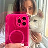 collar, dog, face, fashion, hand, indoors, jewelry, long_hair, manicure, mirror_selfie, pet, photography, pink_phone_case, pointed_ears, portrait, reflection, smartphone, white_dog, window, woman
