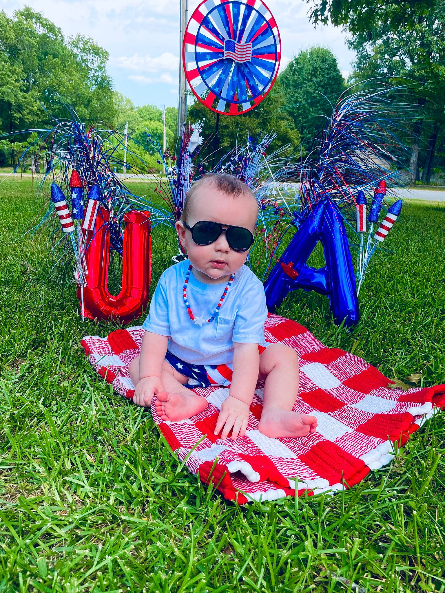 Swayde is registered to the contest to win money with this photo: botany, eyewear, fun, goggles, grass, grass_family, green, happy, lawn, leisure, meadow, people_in_nature, person, plant, recreation, shorts, sky, summer, sunglasses, tree