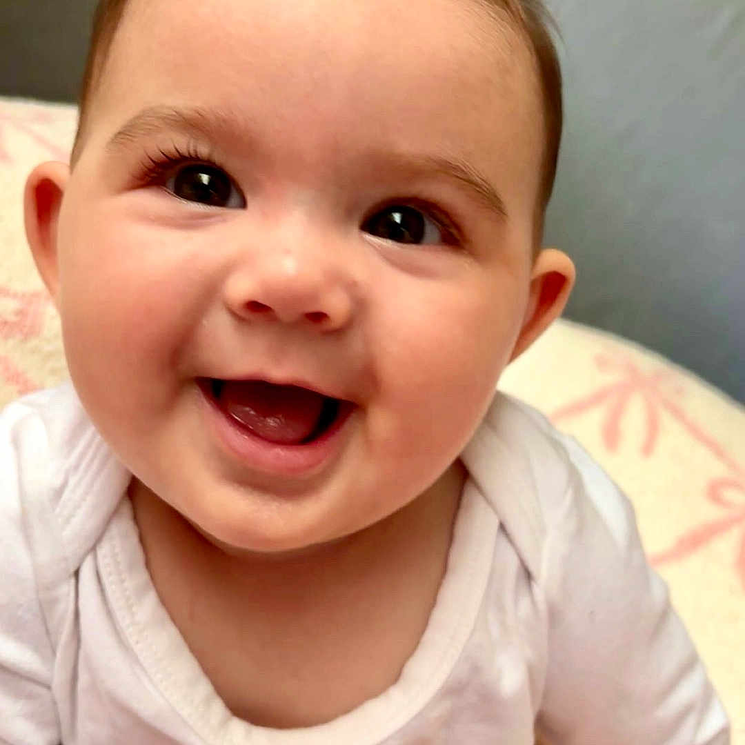 Oaklee joined the competition — help win amazing prizes! baby, babylaughing, crawling, face, happy, head, laughing, person, photography, portrait, smile
