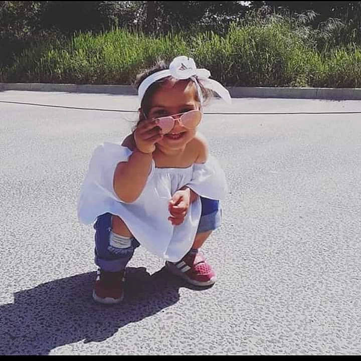 Siham a rejoint le concours — aidez-le/la à gagner de superbes lots ! asphalt, baby_toddler_clothing, cool, electric_blue, eyewear, fashion_accessory, footwear, grass, happy, headband, jewellery, joy, leisure, person, personal_protective_equipment, plant, recreation, sleeve, smile, street_fashion