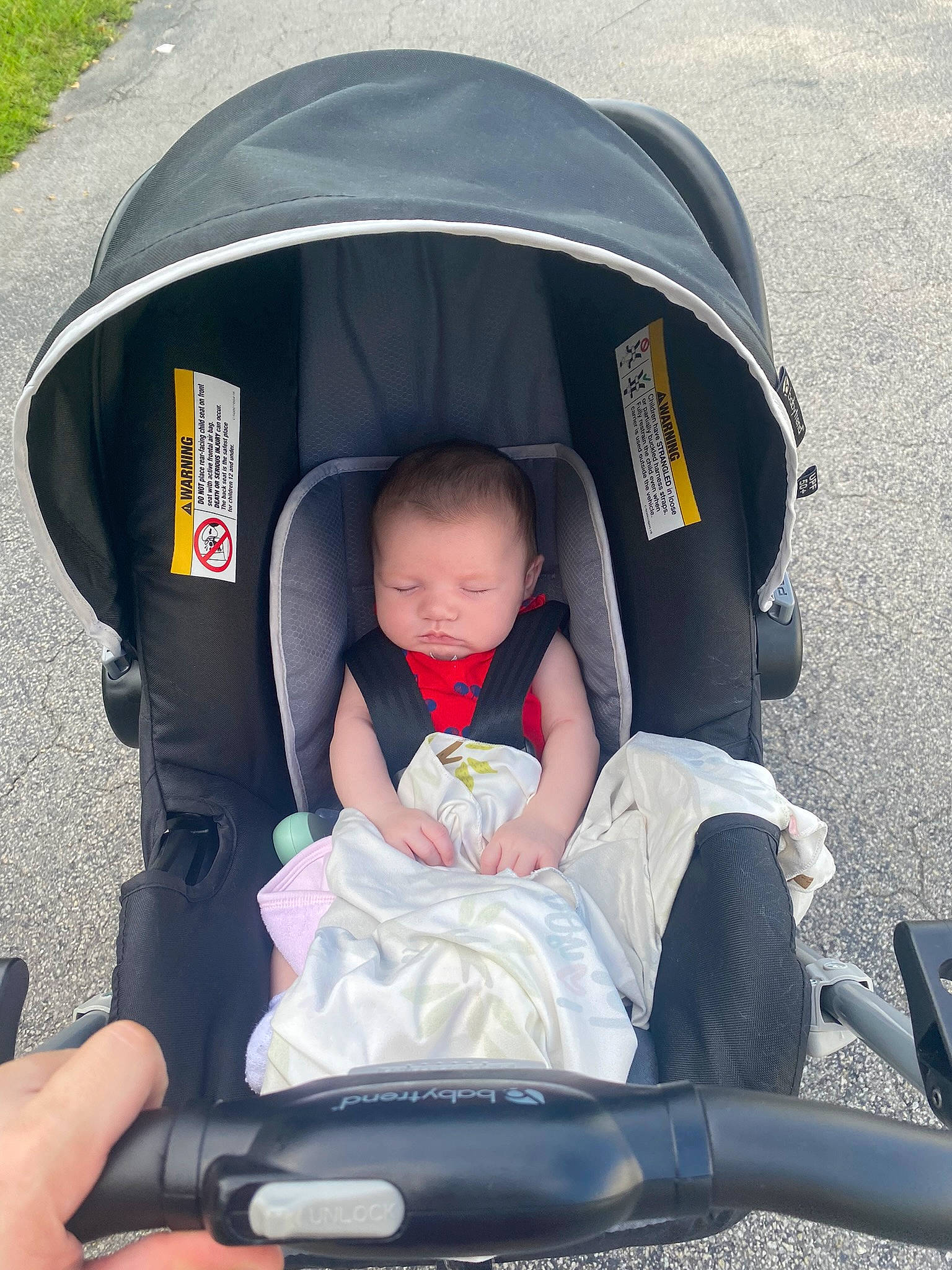 Scarlett is registered to the contest to win money with this photo: auto_part, baby, baby_carriage, baby_products, baby_safety, baby_toddler_clothing, car_seat, chair, child, comfort, fashion_accessory, fun, lap, person, product, sitting, toddler, travel, wheel