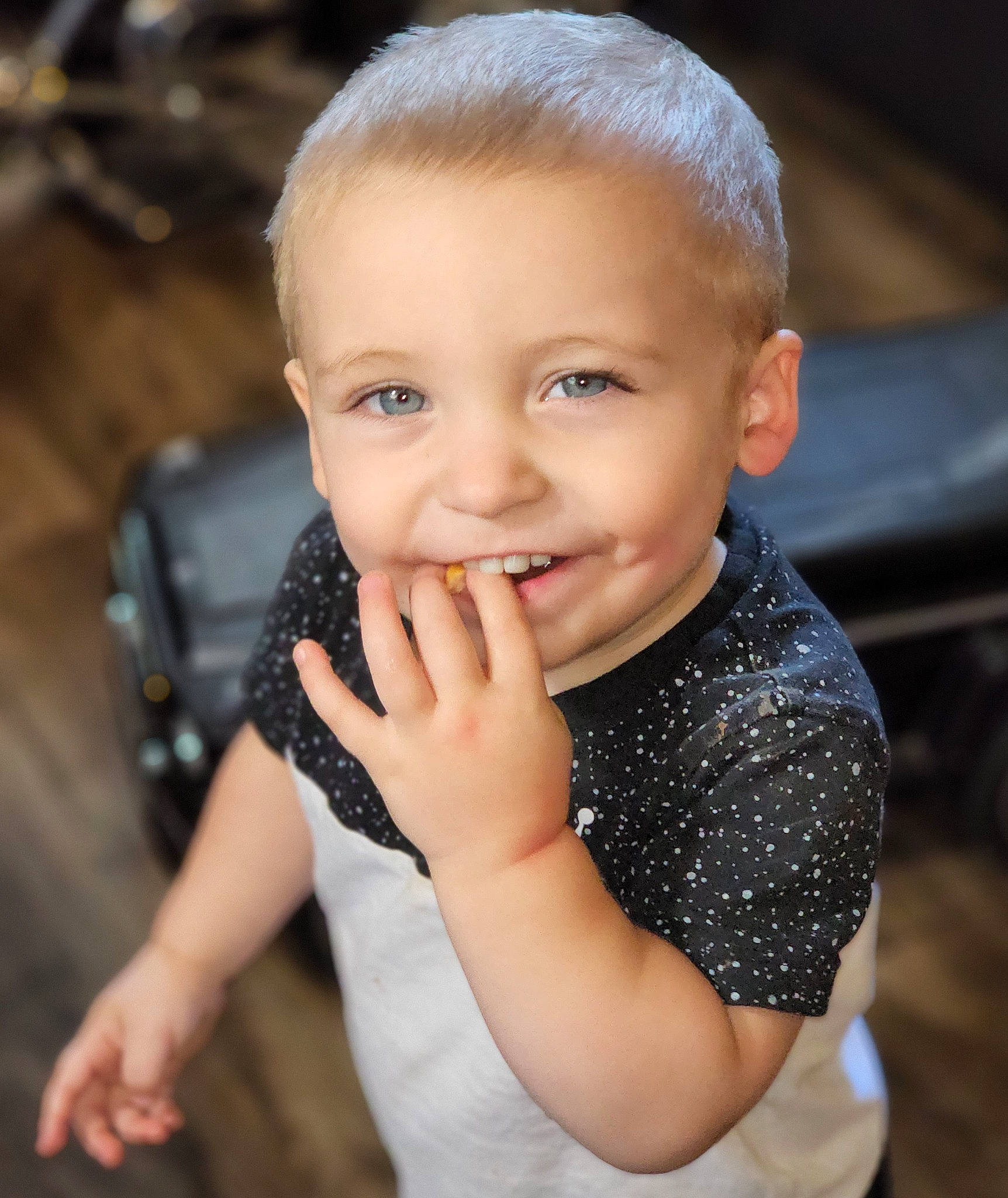 Kieran is registered to the contest to win money with this photo: baby, baby_toddler_clothing, cheek, child, electric_blue, flash_photography, fun, gesture, grass, happy, iris, joy, laugh, lip, nose, person, portrait_photography, skin, smile, thumb