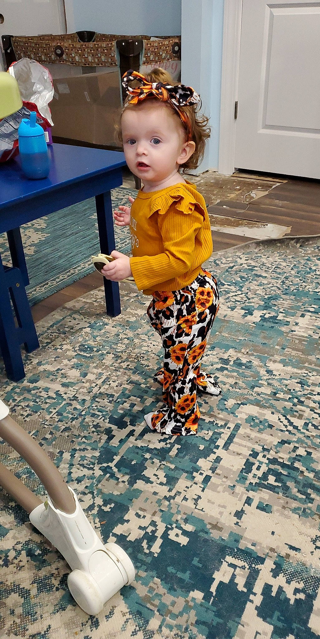 Kenzlee joined the competition — help win amazing prizes! baby, baby_toddler_clothing, child, eye, face, floor, flooring, fun, hair, hairstyle, happy, head, leg, leisure, person, photograph, standing, table, toddler, white