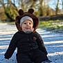 Mylan participe au concours pour gagner de l'argent avec cette photo : baby, boots, child, clothing, coat, cold, happy, hat, nature, outdoor, path, portrait, scarf, seasonal, smiling, snow, sunlight, toddler, trees, winter