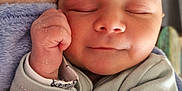 Mylan participe au concours pour gagner de l'argent avec cette photo : baby, blanket, child, closeup, clothing, cozy, cute, face, hand, indoor, infant, newborn, peaceful, portrait, resting, skin, sleeping, soft, tiny, wrapped