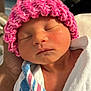 newborn, baby, sleeping, pink_hat, knit_hat, wrapped, blanket, hospital, infant, closeup, face, peaceful, hand, skin, child, portrait, cute, resting, soft_light, cozy