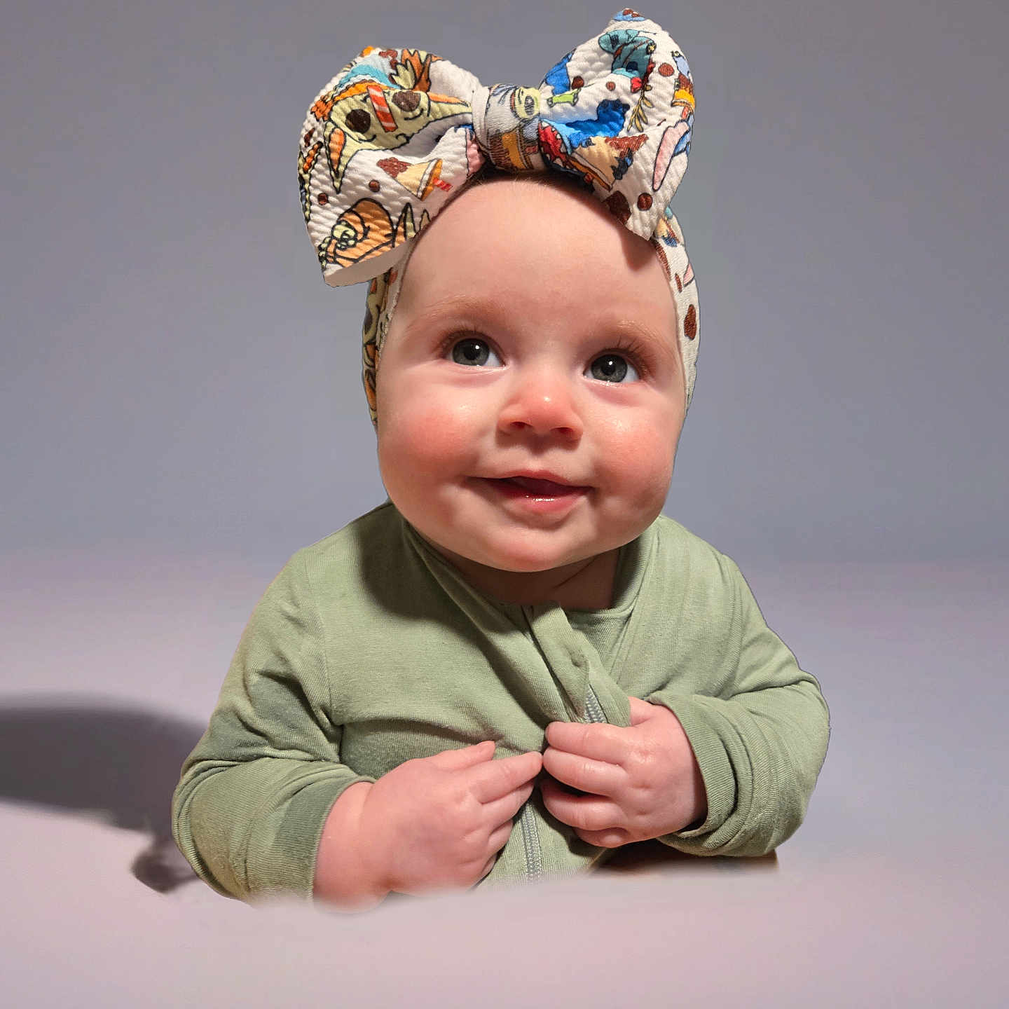 Nichole is registered to the contest to win money with this photo: accessories, baby, bodypart, bonnet, cap, clothing, dress, face, finger, hand, happy, hat, head, newborn, person, photography, portrait, scarf, sitting, smile
