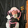 baby, sleeping, pacifier, hat, onesie, stroller, baby_clothing, infant, child, polka_dot, pink, black, strap, wood_floor, indoor, cute, peaceful, newborn, baby_accessory, headwear