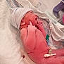 Rhylee is registered to the contest to win money with this photo: newborn, baby, hospital, infant, bed, hat, medical_tube, skin, sleeping, child, human, person, healthcare, blanket, delivery, fresh, cute, small, lying_down, maternity
