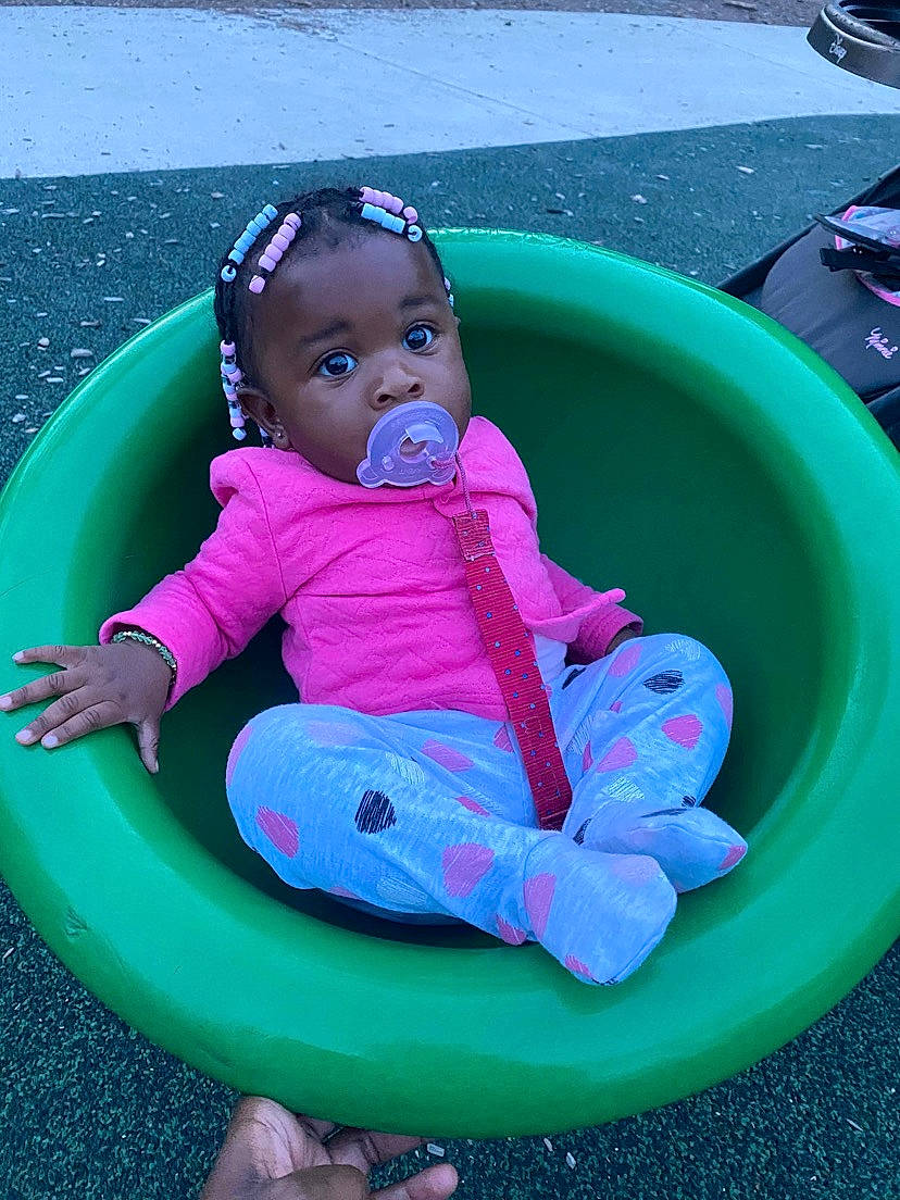 Anavi is registered to the contest to win money with this photo: aqua, baby, baby_toddler_clothing, blue, child, circle, comfort, electric_blue, fun, green, leisure, magenta, person, pink, play, product, purple, recreation, sitting, toddler