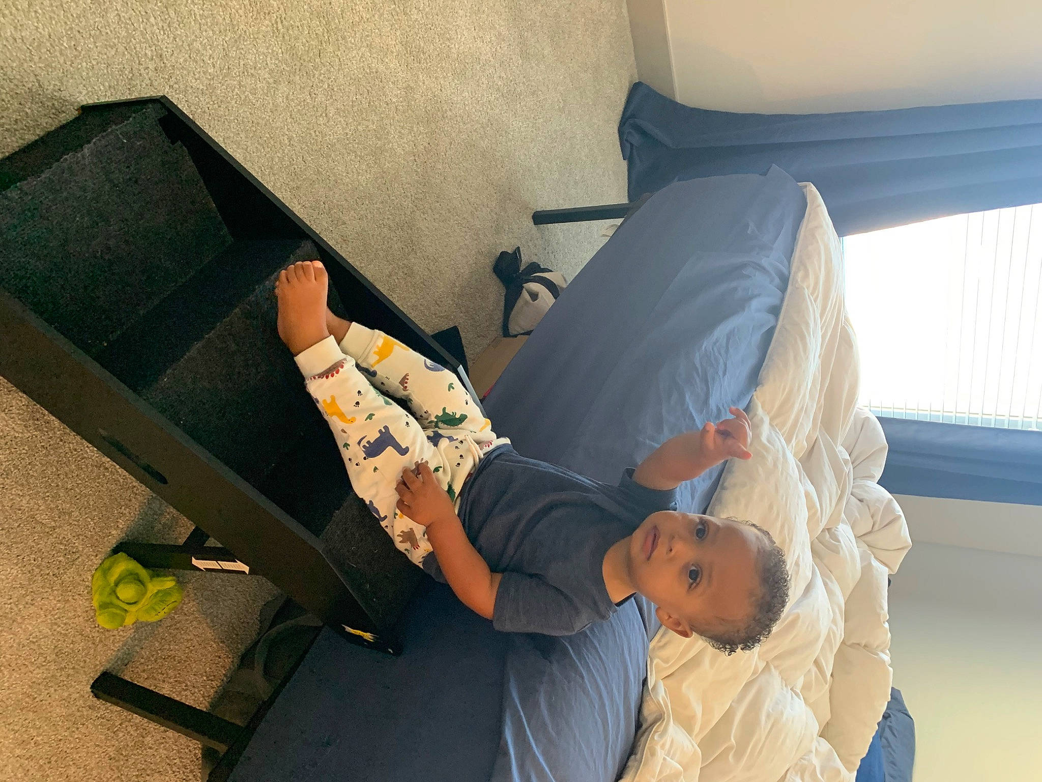 Lance is registered to the contest to win money with this photo: bed, chair, comfort, couch, dress, elbow, furniture, hospital, human_leg, joint, knee, leg, leisure, patient, person, room, service, sitting, t_shirt, thigh