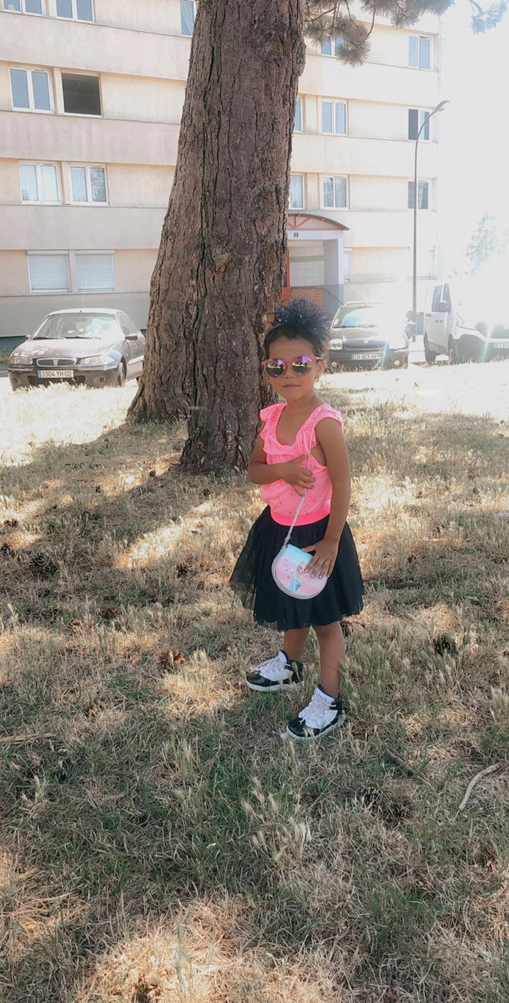 Inaya participe au concours pour gagner de l'argent avec cette photo : dress, grass, leg, person, plant, shoe, thigh, tree