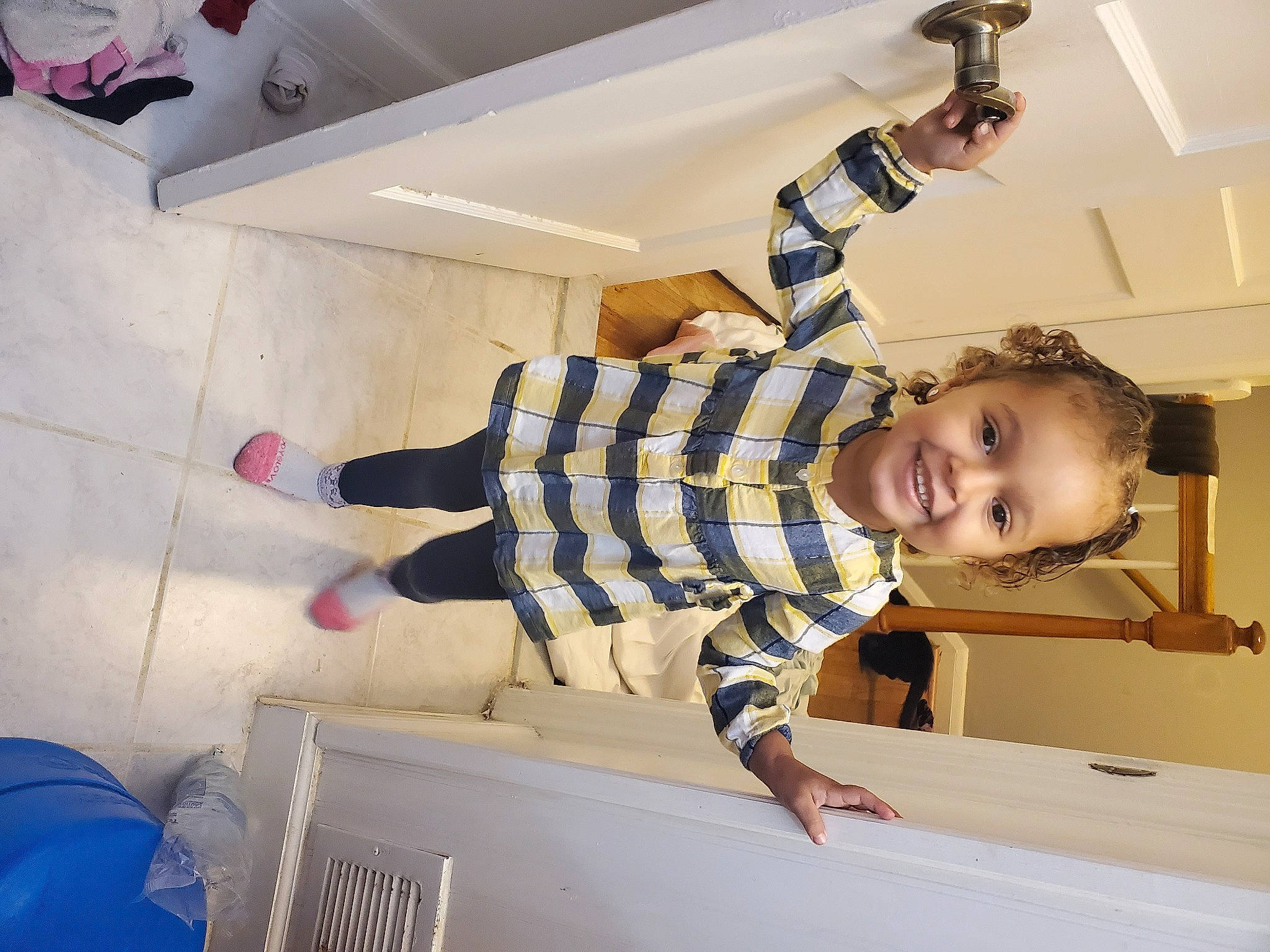 Autumn is registered to the contest to win money with this photo: baby_toddler_clothing, ceiling, child, comfort, elbow, flooring, fun, happy, joy, leisure, pattern, person, room, smile, sock, t_shirt, toddler, wood