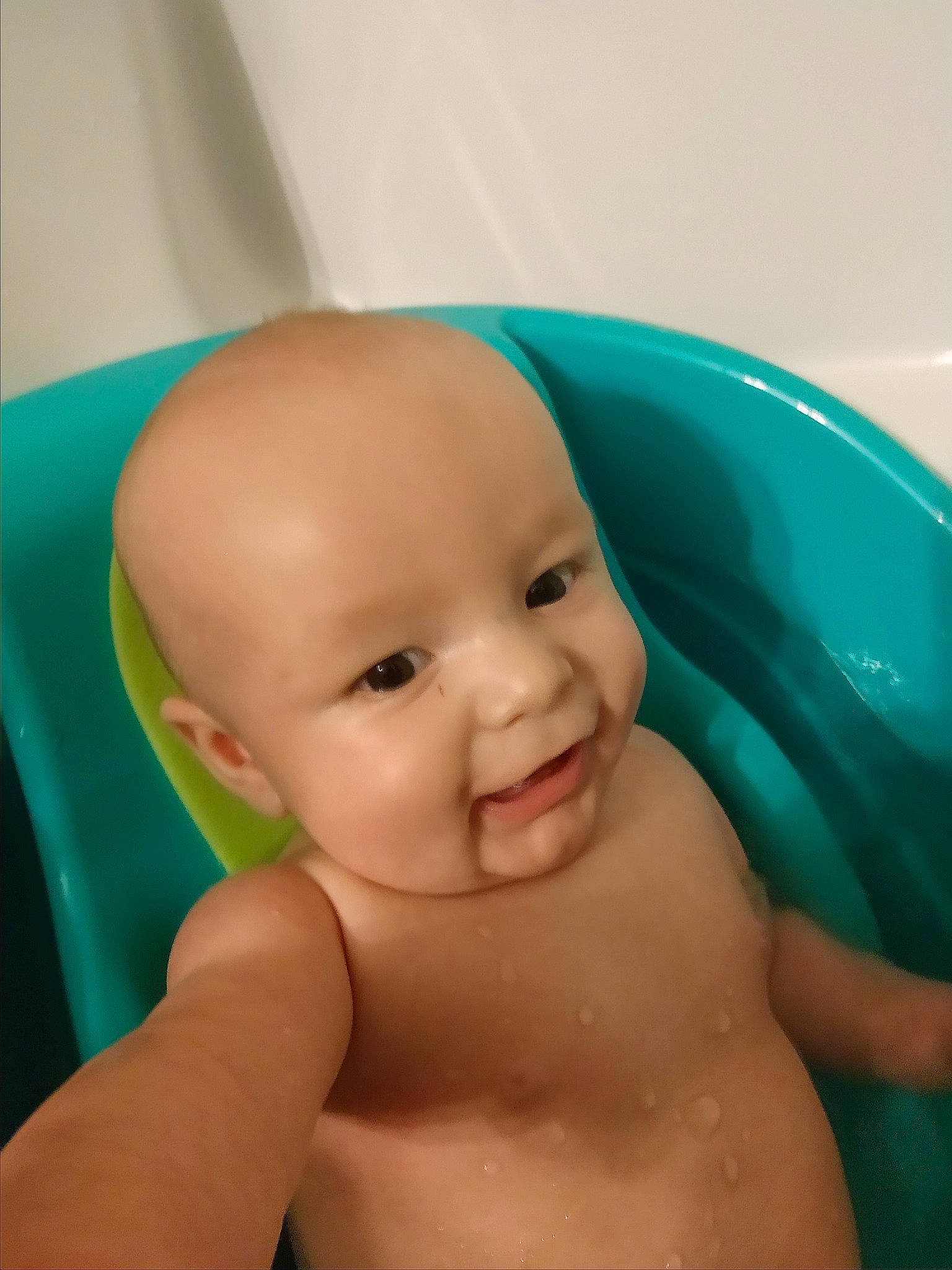 Colton Shawn is registered to the contest to win money with this photo: baby, baby_bathing, bathing, bathtub, cheek, child, eye, face, fun, head, leisure, mouth, person, product, skin, smile, toddler, washing