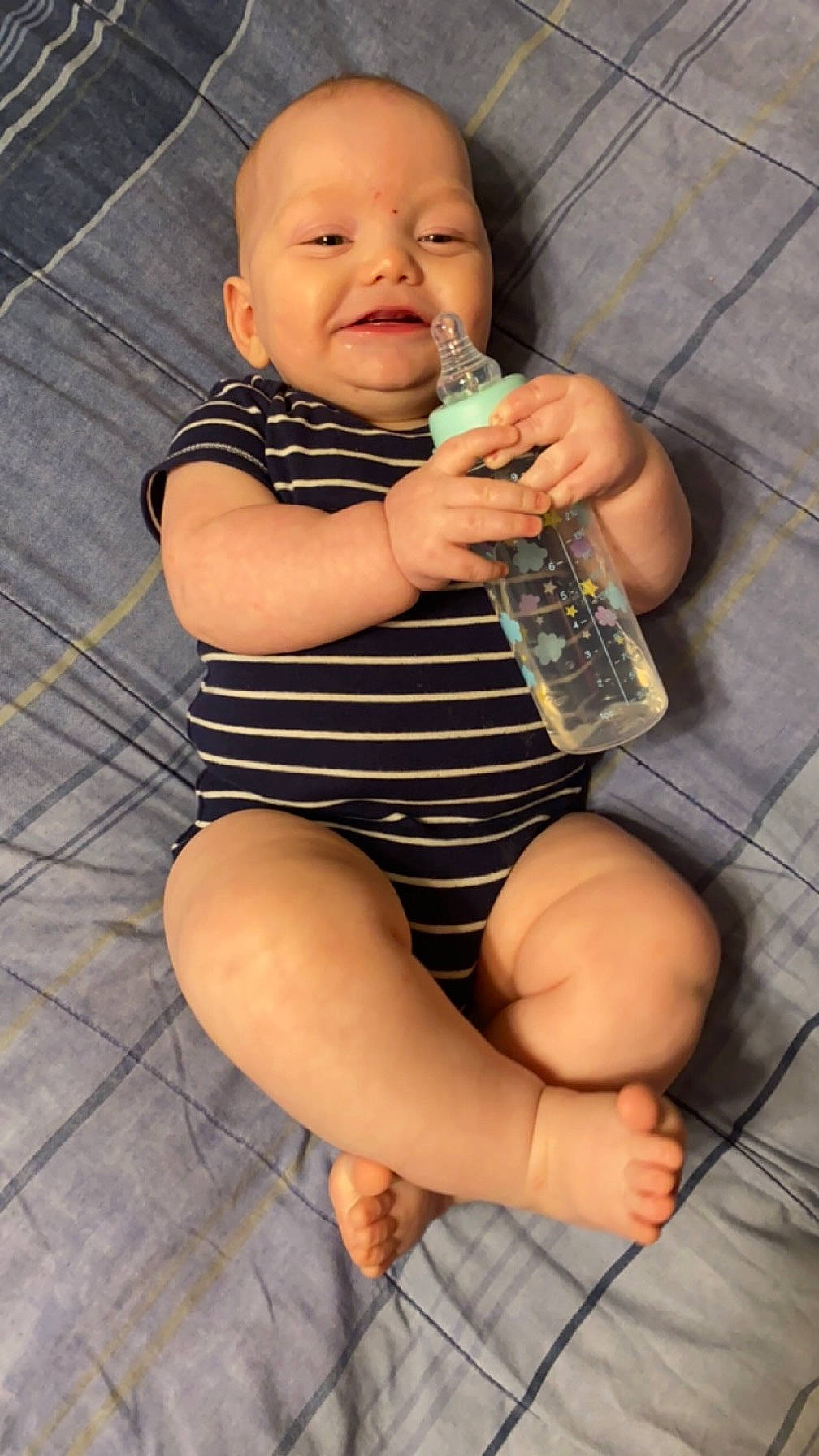 Oliver joined the competition — help win amazing prizes! baby, baby_toddler_clothing, bottle, chest, drinkware, face, finger, hand, human_body, joint, knee, leg, mouth, nail, person, plastic_bottle, skin, smile, thigh, thumb