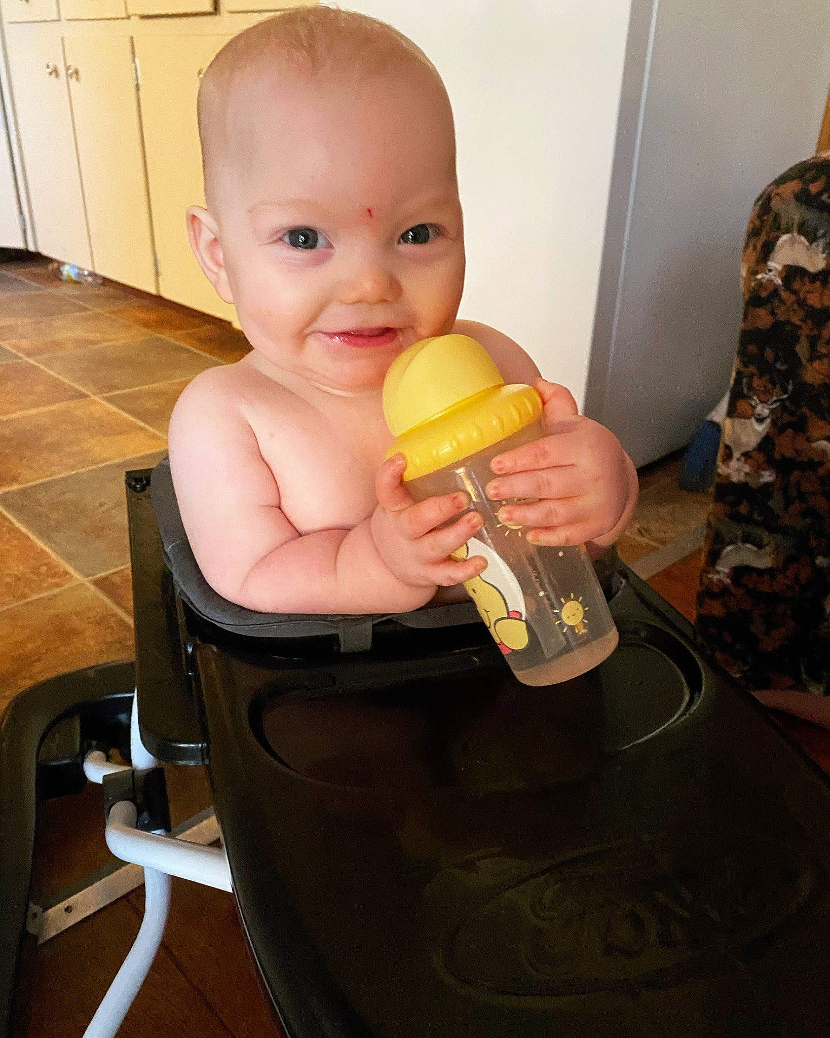 Oliver is registered to the contest to win money with this photo: baby, baby_grabbing_for_something, baby_playing_with_toys, baby_products, baby_toddler_clothing, bathing, cabinetry, camouflage, cheek, finger, flooring, fun, gesture, hand, happy, human_body, joy, nail, person, smile