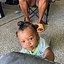 Amun-Ra joined the competition — help win amazing prizes! toddler, child, baby, indoor, carpet, person, hair_buns, reaching, floor, adult, legs, slippers, chair, casual, curious, living_room, home, candid, portrait, cute