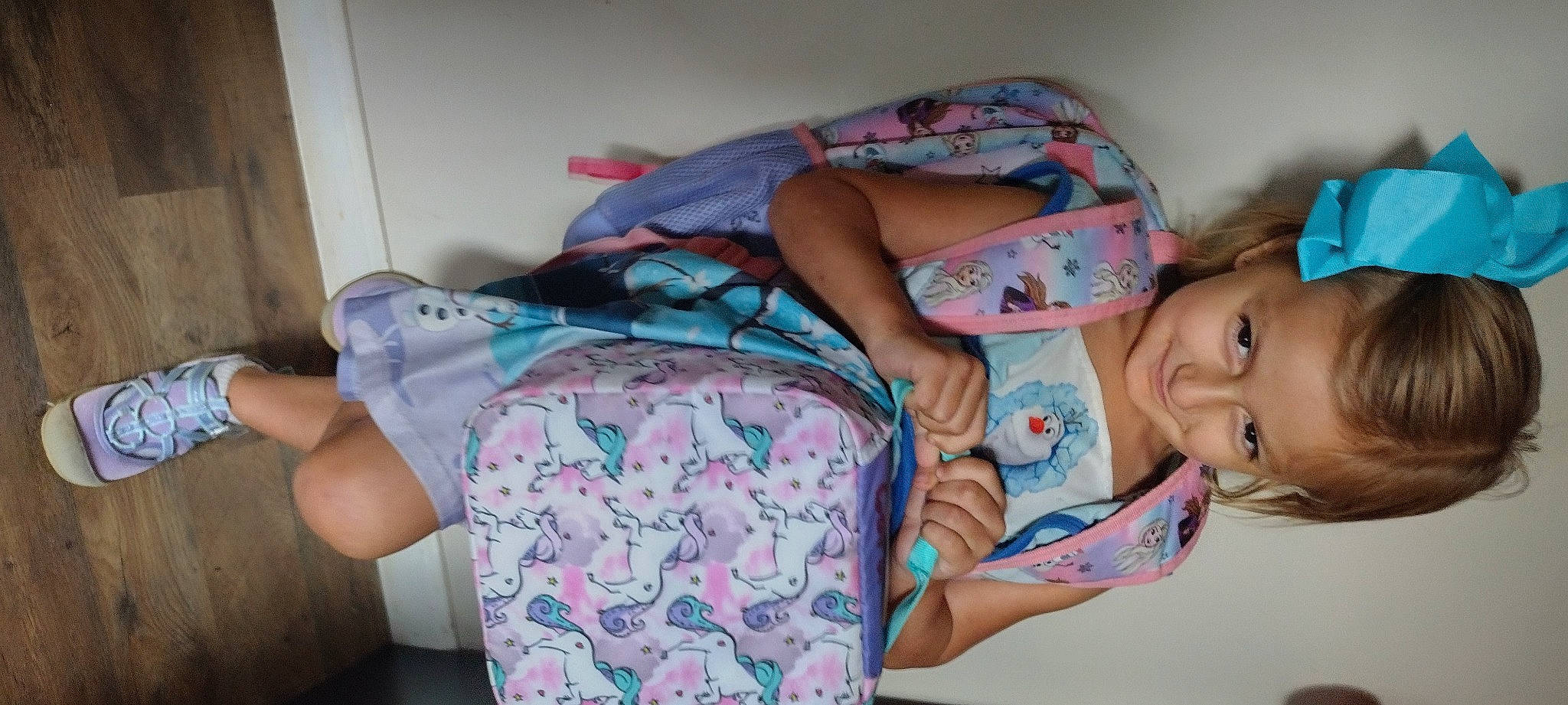 Coraline is registered to the contest to win money with this photo: arm, baby, baby_products, baby_toddler_clothing, bedtime, child, comfort, hand, happy, joy, linens, magenta, nap, pattern, person, pink, purple, room, sitting, sleeve