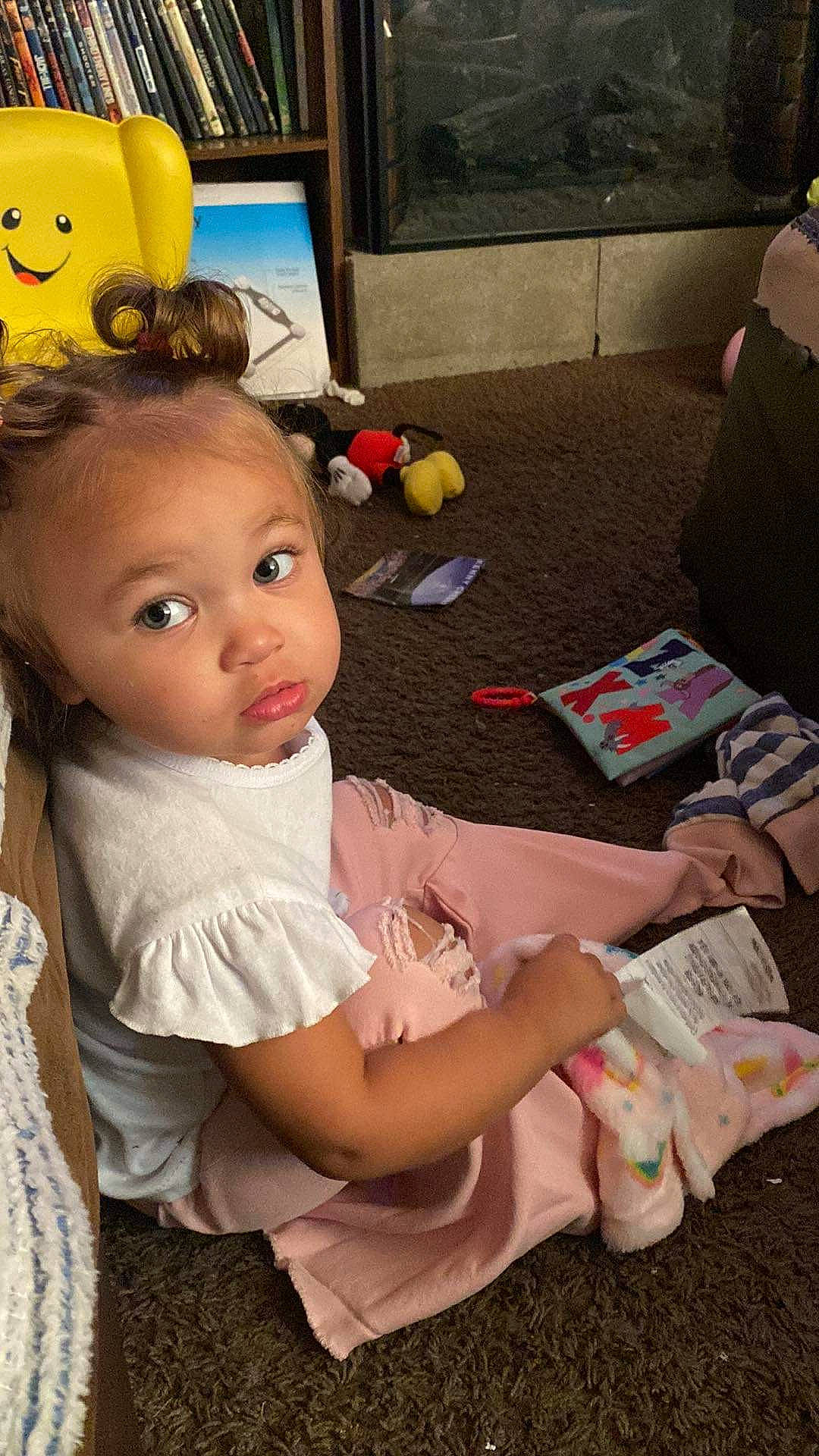 Alezha is registered to the contest to win money with this photo: audio_equipment, baby, baby_toddler_clothing, box, child, couch, dress, eyelash, flooring, fun, happy, human_leg, lap, person, play, room, shipping_box, sitting, surprise, toddler