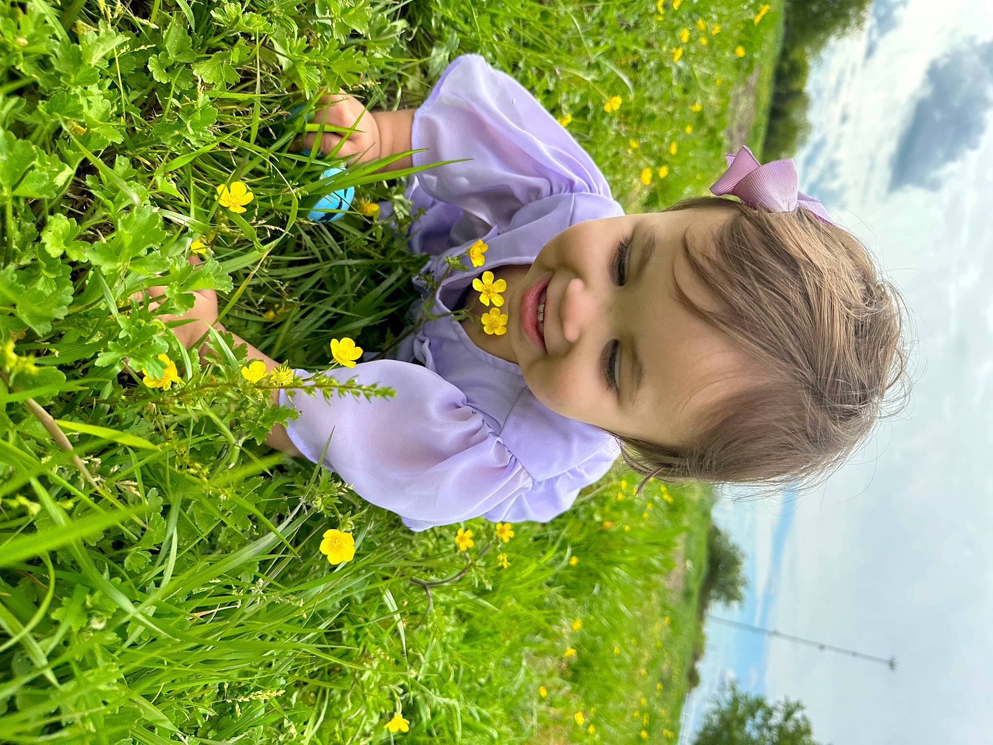 Alezha joined the competition — help win amazing prizes! annual_plant, baby_toddler_clothing, child, electric_blue, flower, flowering_plant, fun, grass, grass_family, grassland, groundcover, happy, joy, meadow, people_in_nature, person, plant, prairie, sky, smile