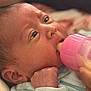 Isabella joined the competition — help win amazing prizes! baby, infant, feeding, bottle, pink, closeup, hand, face, sleepwear, newborn, cute, skin, eyes, mouth, comfort, soft, child, feedingtime, portrait, cozy