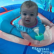 Noelle joined the competition — help win amazing prizes! baby, blue, child, cute, float, fun, hand, infant, outdoor, person, pink, plastic, play, pool, ripple, summer, swim_ring, swimming, toy, water