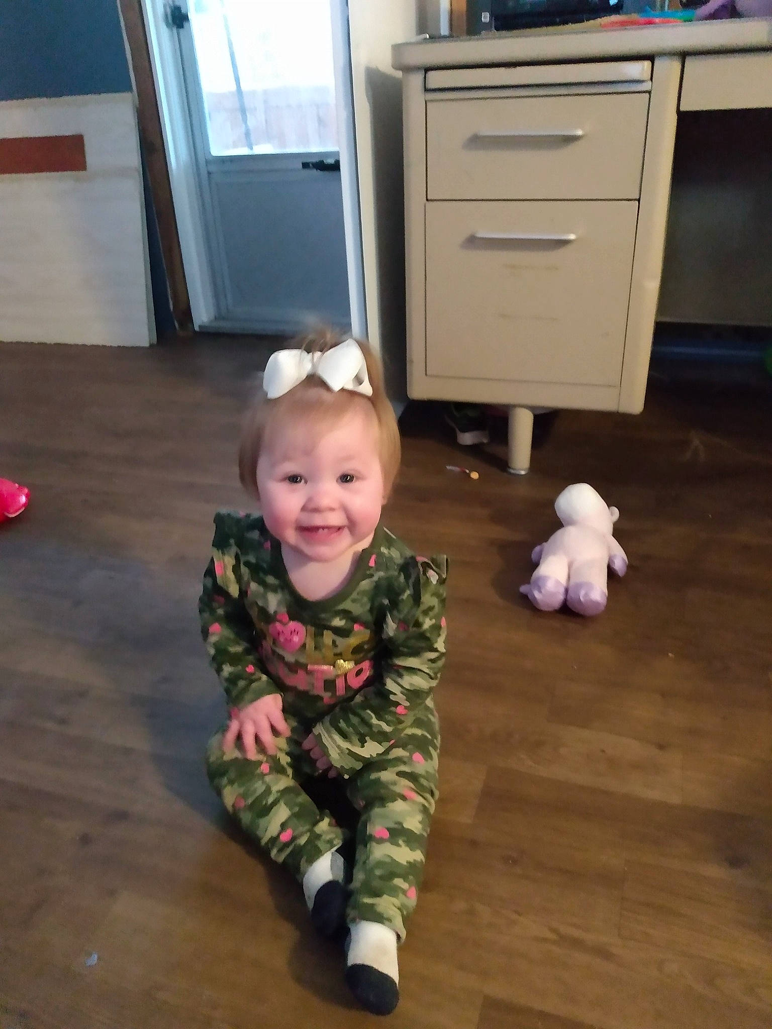 Tinsley is registered to the contest to win money with this photo: child, crawling, floor, flooring, joy, person, play, room, skin, standing, toddler