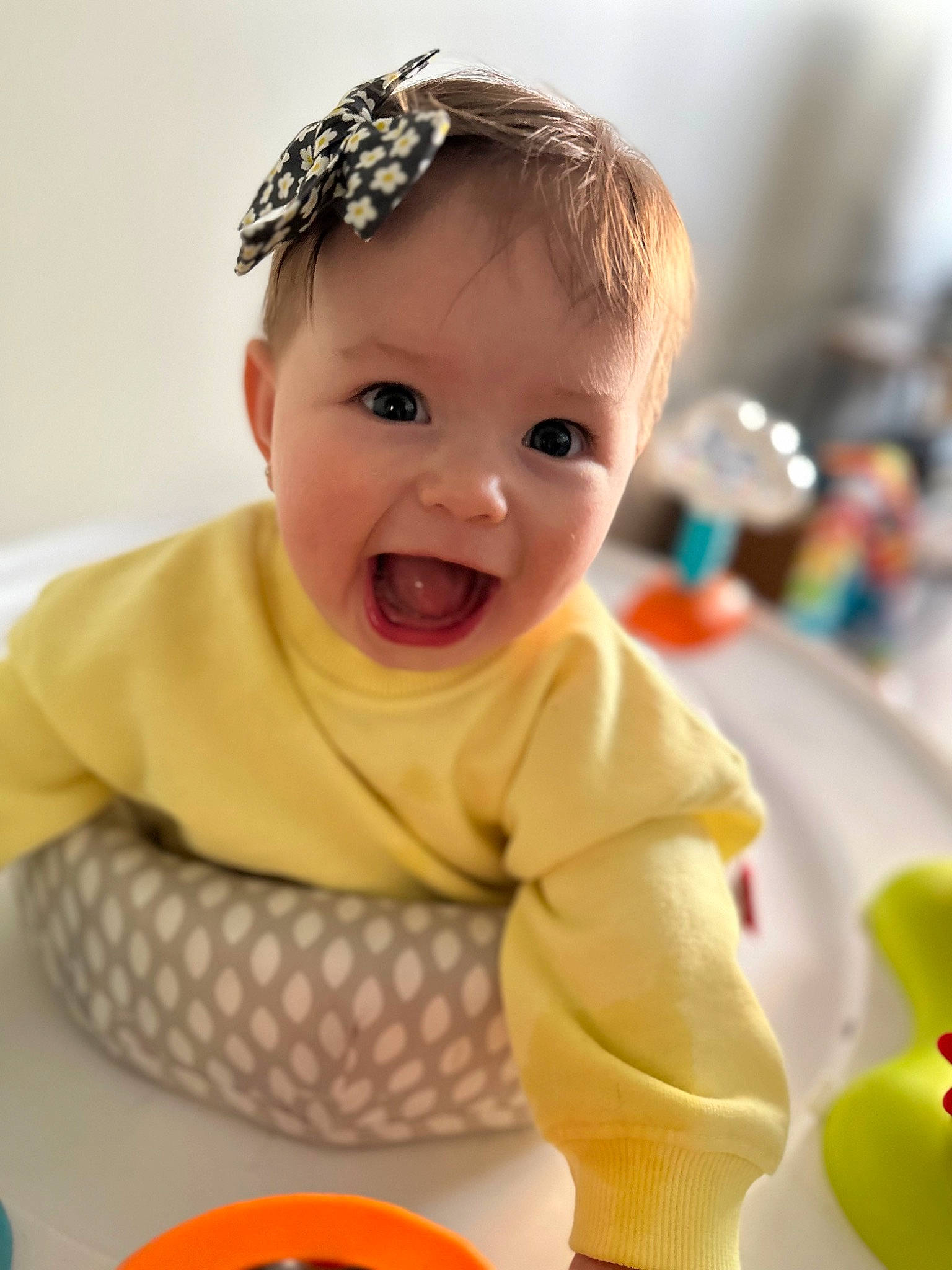 Amaia is registered to the contest to win money with this photo: baby, baby_laughing, baby_playing_with_toys, baby_products, baby_toddler_clothing, cap, child, facial_expression, fun, happy, head, headpiece, people, person, product, skin, sleeve, smile, toddler, white