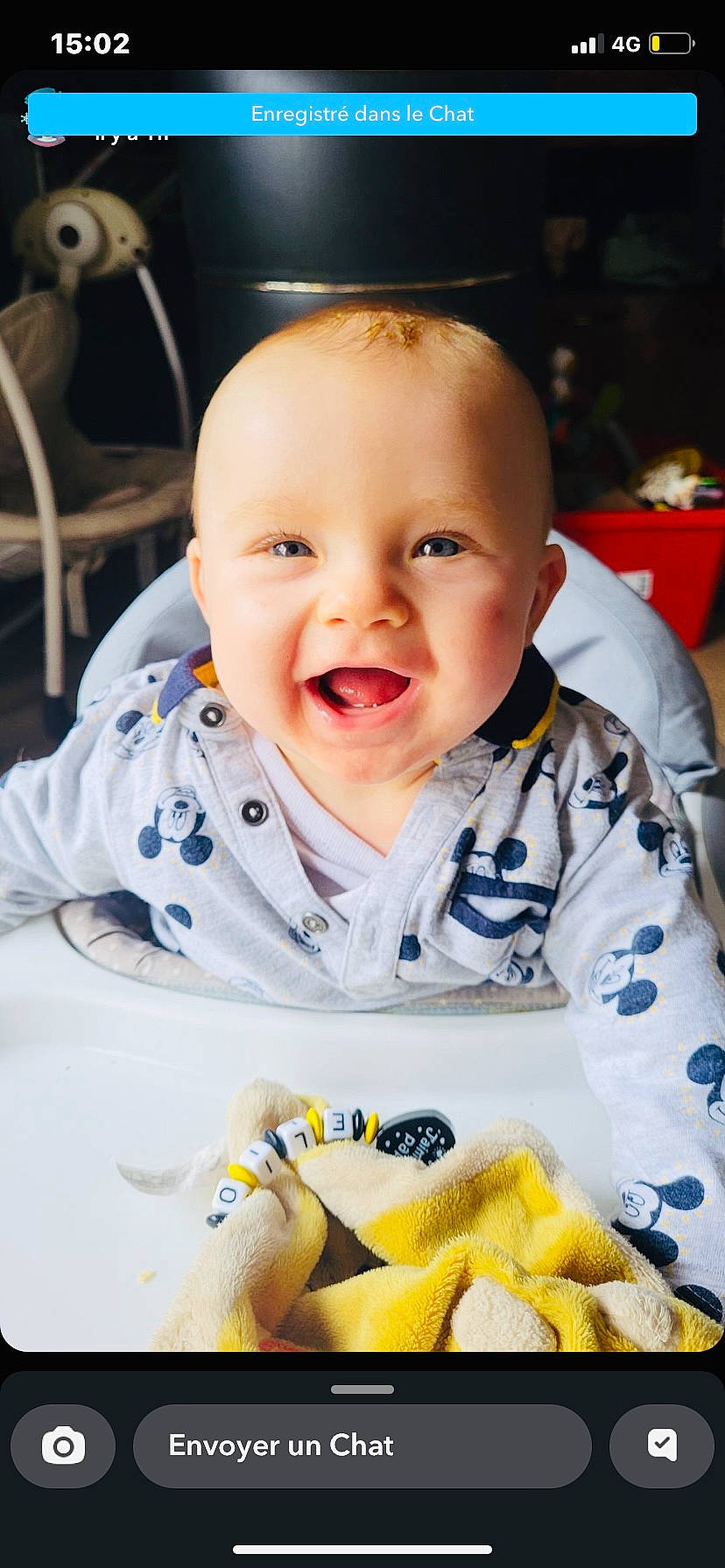 élio participe au concours pour gagner de l'argent avec cette photo : baby, baby_toddler_clothing, chair, cheek, child, comfort_food, eye, facial_expression, finger, fun, happy, mouth, nose, person, sitting, skin, sleeve, smile, textile, toddler