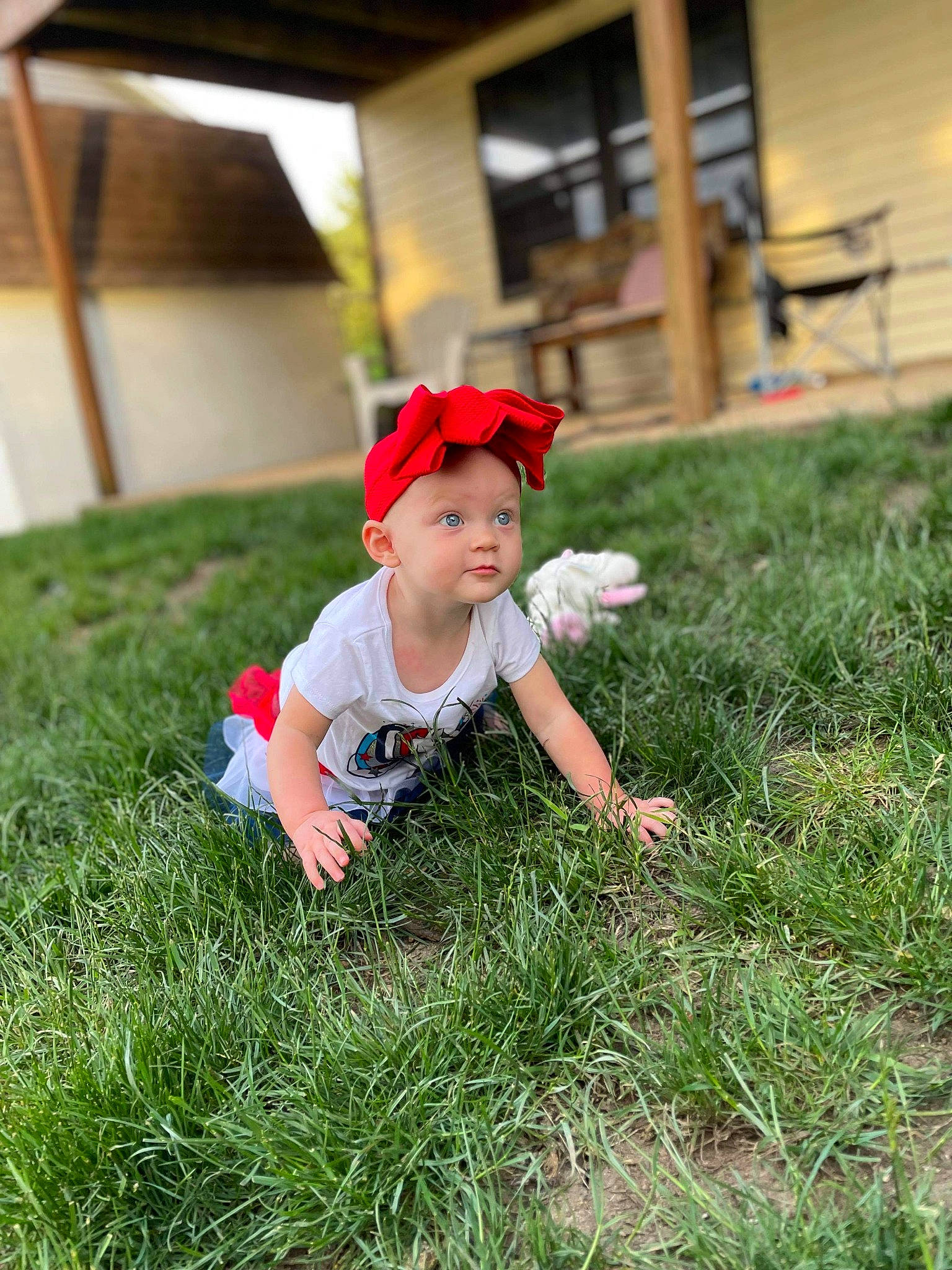 Ellieanna joined the competition — help win amazing prizes! baby, baby_toddler_clothing, child, flower, fun, garden, grass, grassland, happy, hat, landscape, leisure, meadow, people_in_nature, person, plant, prairie, recreation, sitting, sun_hat