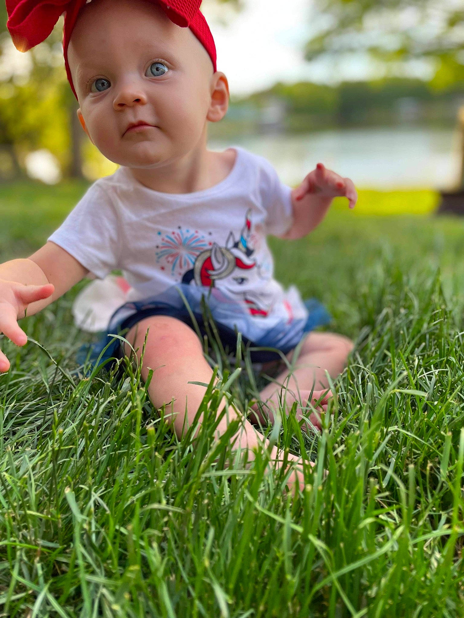 Ellieanna joined the competition — help win amazing prizes! baby, baby_toddler_clothing, dress, eye, facial_expression, fun, grass, green, happy, leaf, leg, leisure, light, people_in_nature, person, plant, shorts, skin, sunlight, t_shirt