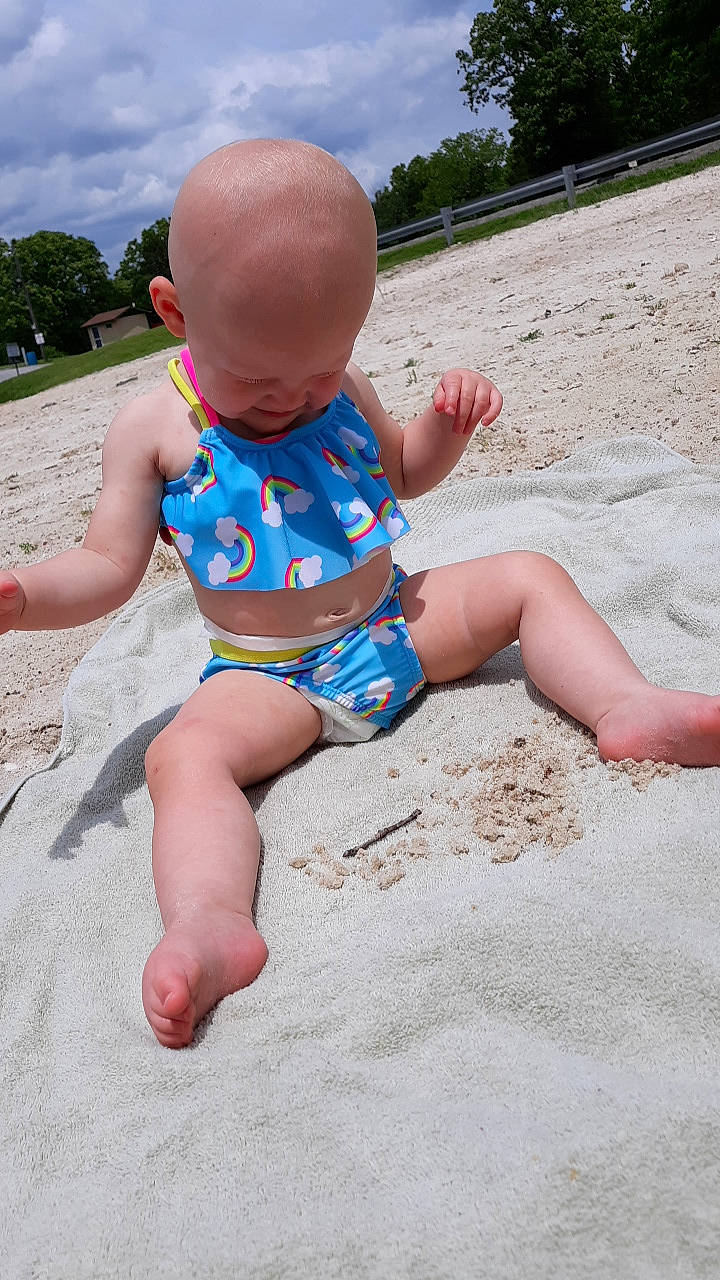 Ellieanna is registered to the contest to win money with this photo: baby, baby_toddler_clothing, barefoot, beach, blue, chest, cloud, electric_blue, fun, human_leg, leg, leisure, person, recreation, sky, summer, thigh, toddler, tree, trunk