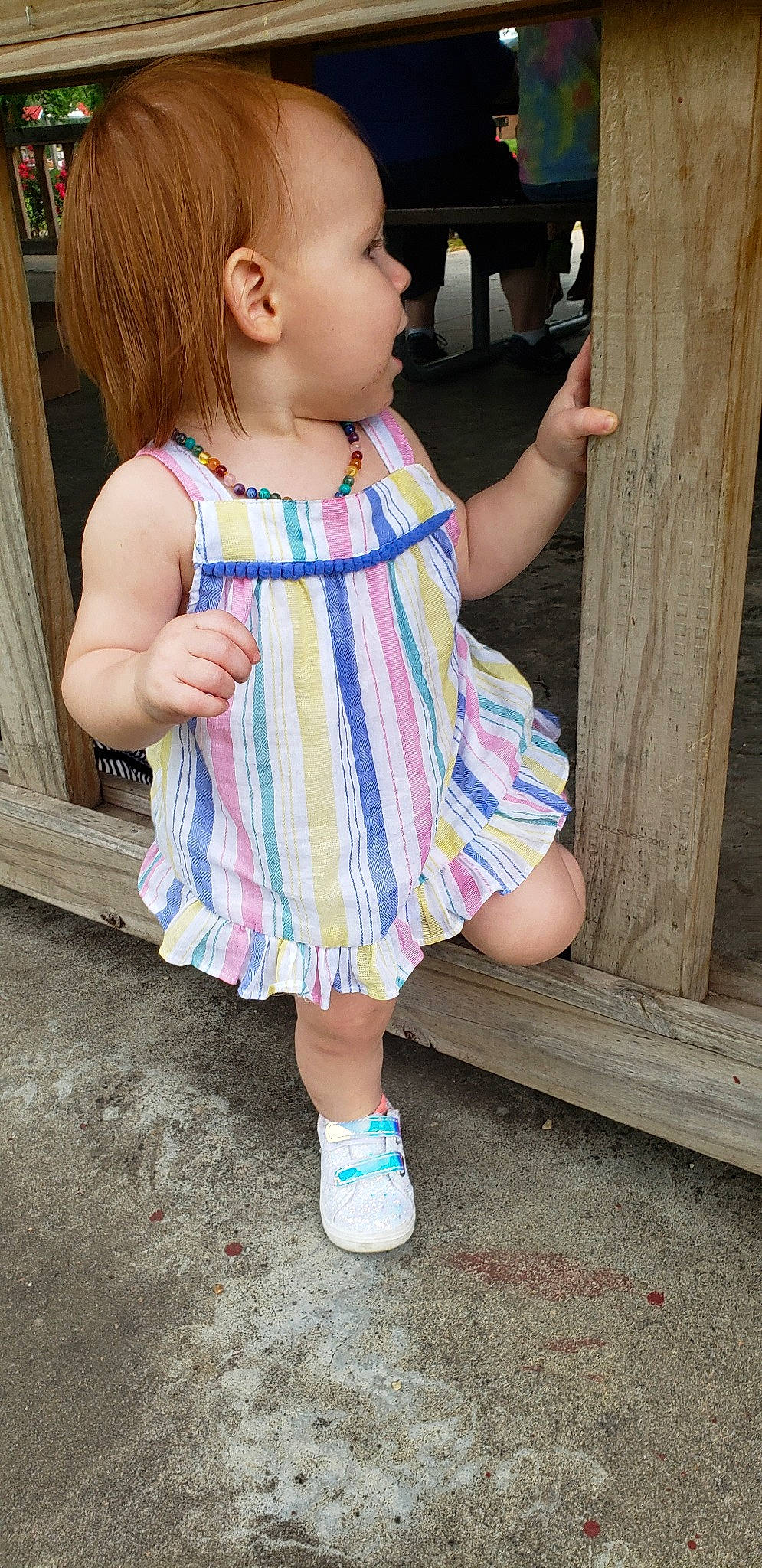 Alessa is registered to the contest to win money with this photo: baby, cheek, child, child_model, design, dress, footwear, leg, pattern, person, play, shoe, skin, smile, standing, summer, t_shirt, textile, toddler, vacation