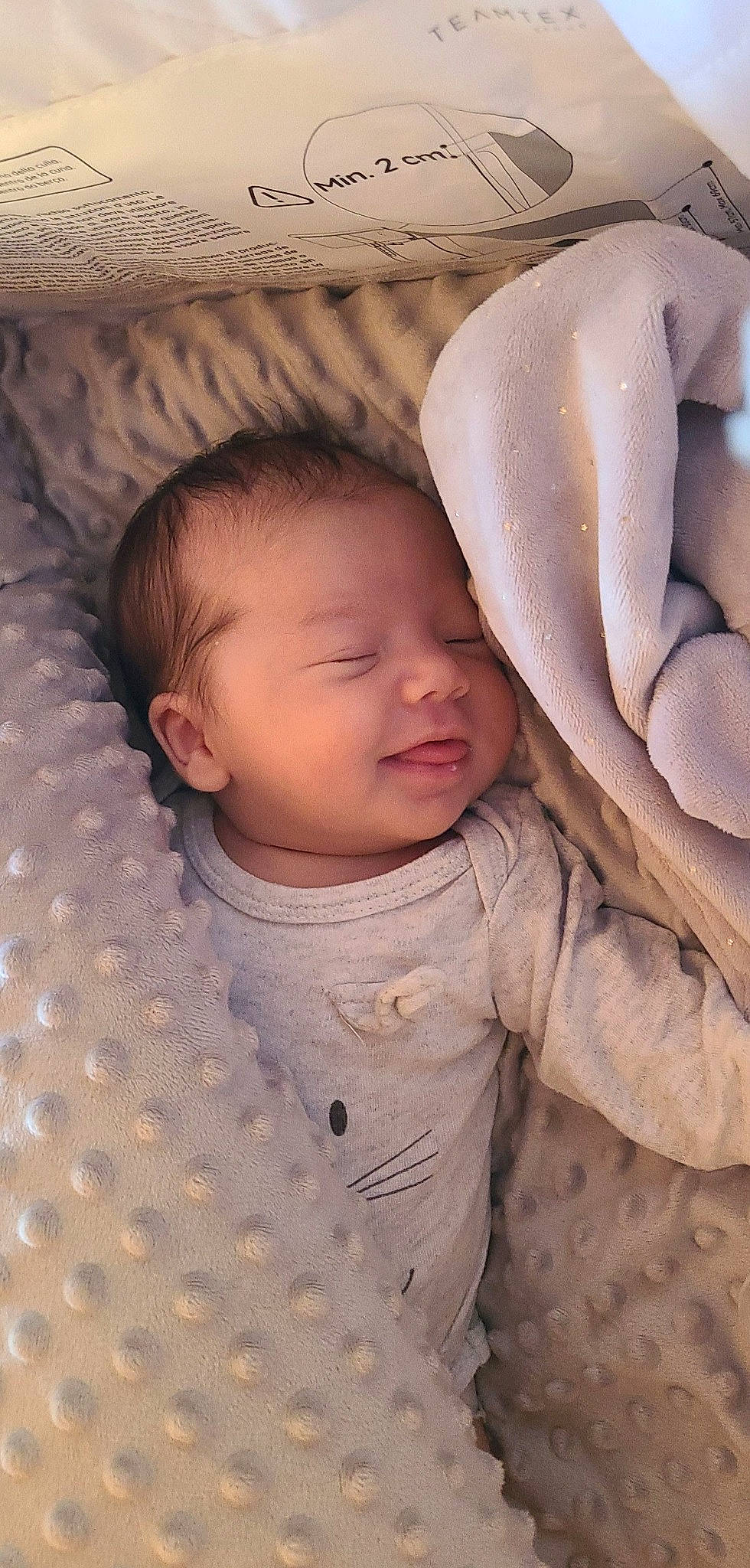 Kataleya participe au concours pour gagner de l'argent avec cette photo : baby, baby_toddler_clothing, bedding, cheek, child, comfort, eye, face, gesture, hairstyle, head, linens, mammal, mouth, nose, person, skin, sleeve, textile, toddler