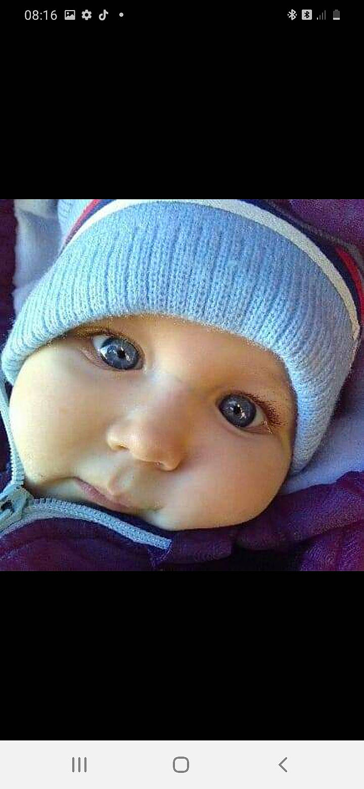 Kyliann a rejoint le concours — aidez-le/la à gagner de superbes lots ! baby, baby_toddler_clothing, beanie, cap, cheek, cool, electric_blue, eye, fashion_accessory, headgear, headwear, knit_cap, lip, magenta, nose, person, sleeve, toddler, violet, winter