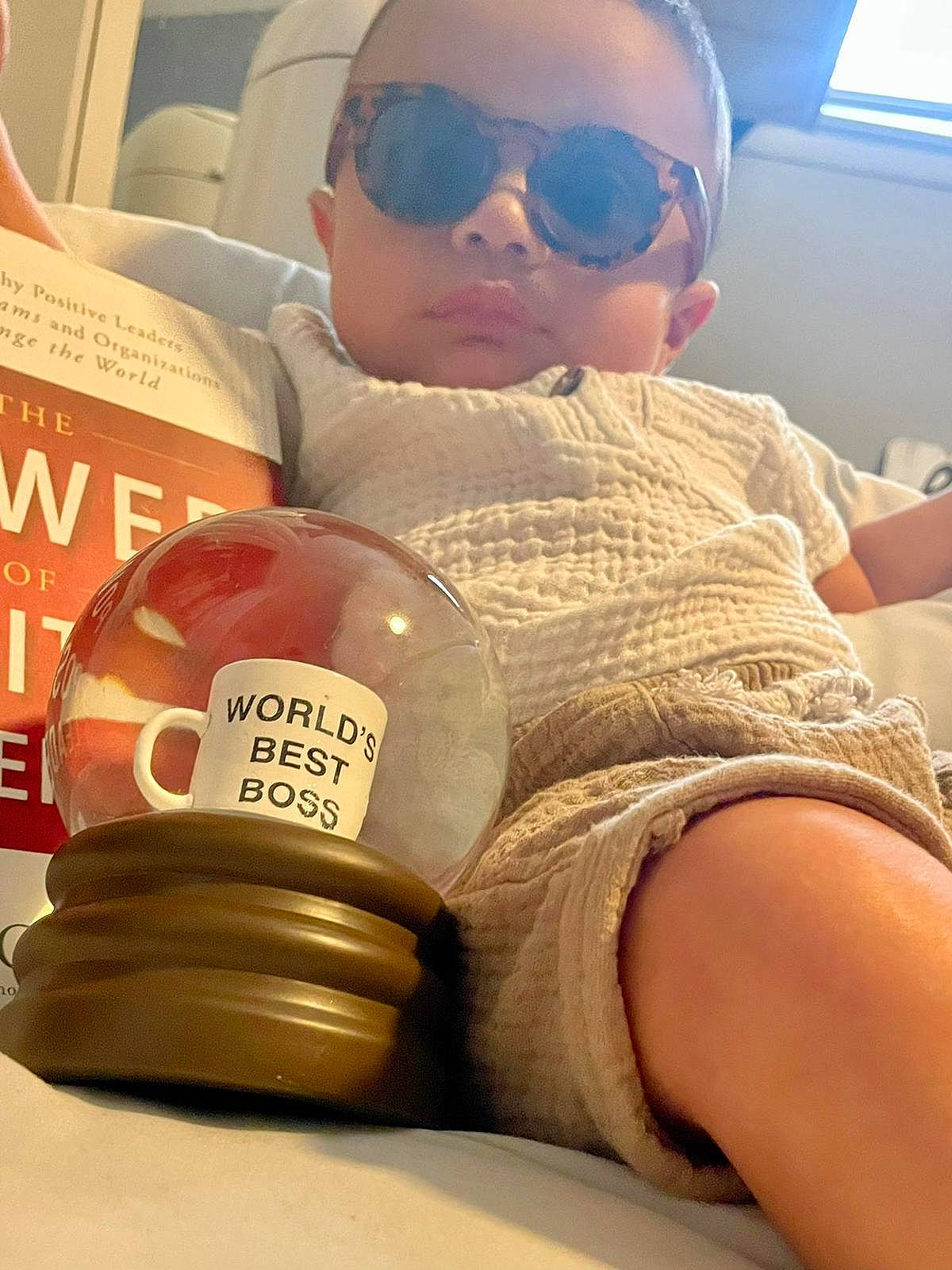 Sebastian joined the competition — help win amazing prizes! beauty, cap, child, comfort, eyewear, fashion_accessory, glasses, goggles, hat, headgear, helmet, human_leg, leisure, person, personal_protective_equipment, sitting, sports_gear, sunglasses, thigh, toddler