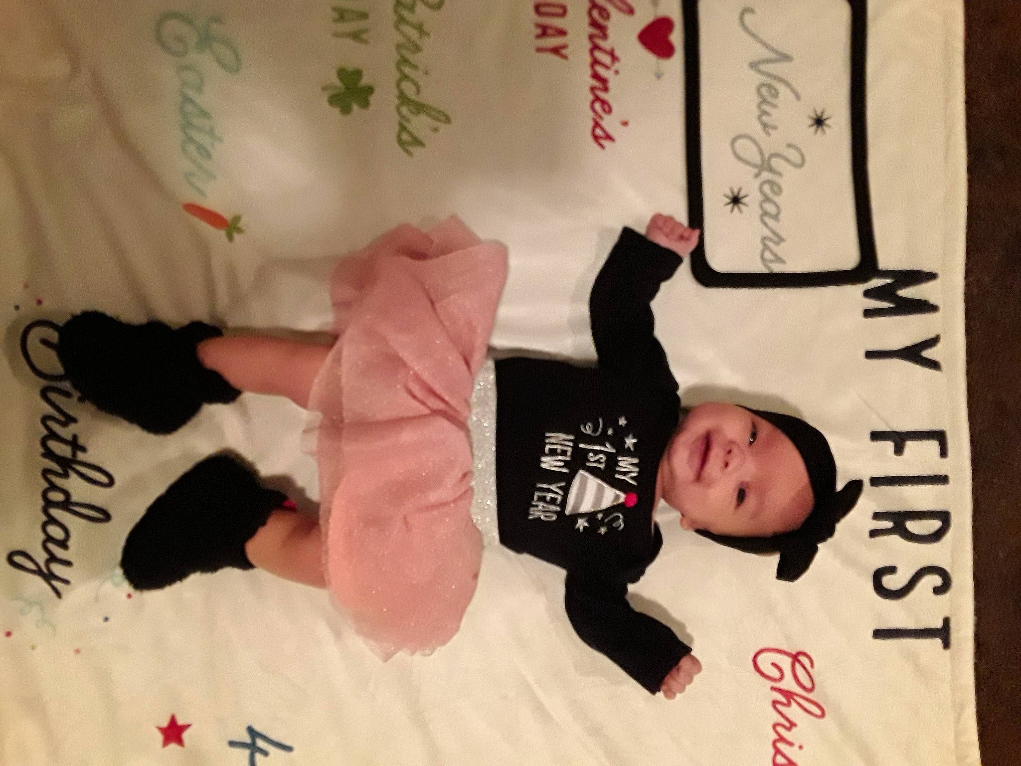 Layla joined the competition — help win amazing prizes! arm, baby_toddler_clothing, child, flooring, font, happy, headwear, human_body, magenta, person, pink, room, sleeve, toddler